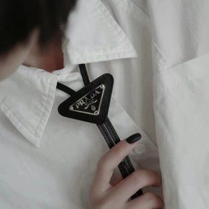 Prada black triangle tie